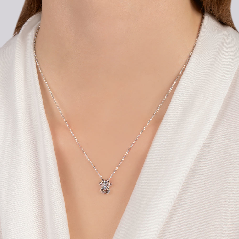 Hallmarkfinejewelry Puppy Paw Pendant in Sterling Silver with 1/20 Cttw Diamonds in Center