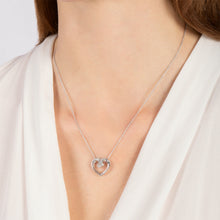 Load image into Gallery viewer, Hallmarkfinejewelry Hugging Heart Pendant in Sterling Silver with 1/6 Cttw of Diamonds
