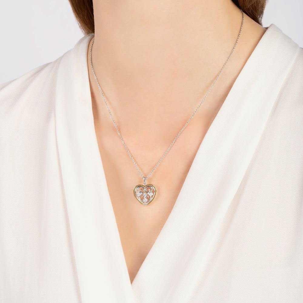 Hallmarkfinejewelry Gilded Lace Heart Pendant in Sterling Silver and 14K Yellow Gold with Diamonds