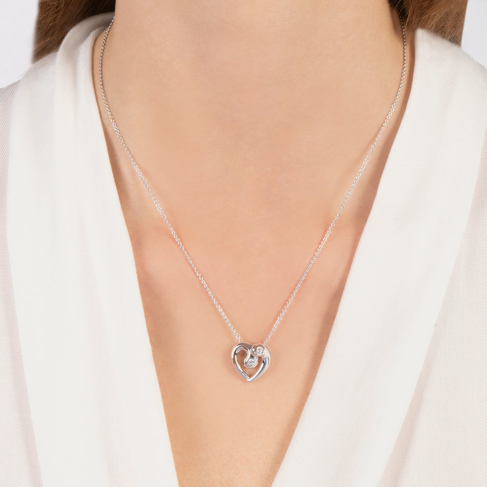 Hallmarkfinejewelry Modern Overlapping Heart Pendant in Sterling Silver with 1/10 Cttw of Diamonds