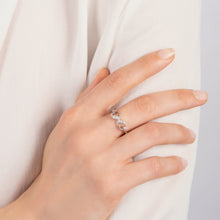 Load image into Gallery viewer, Hallmarkfinejewelry Contemporary Infinity Ring in Sterling Silver with 1/10 Cttw of Diamonds
