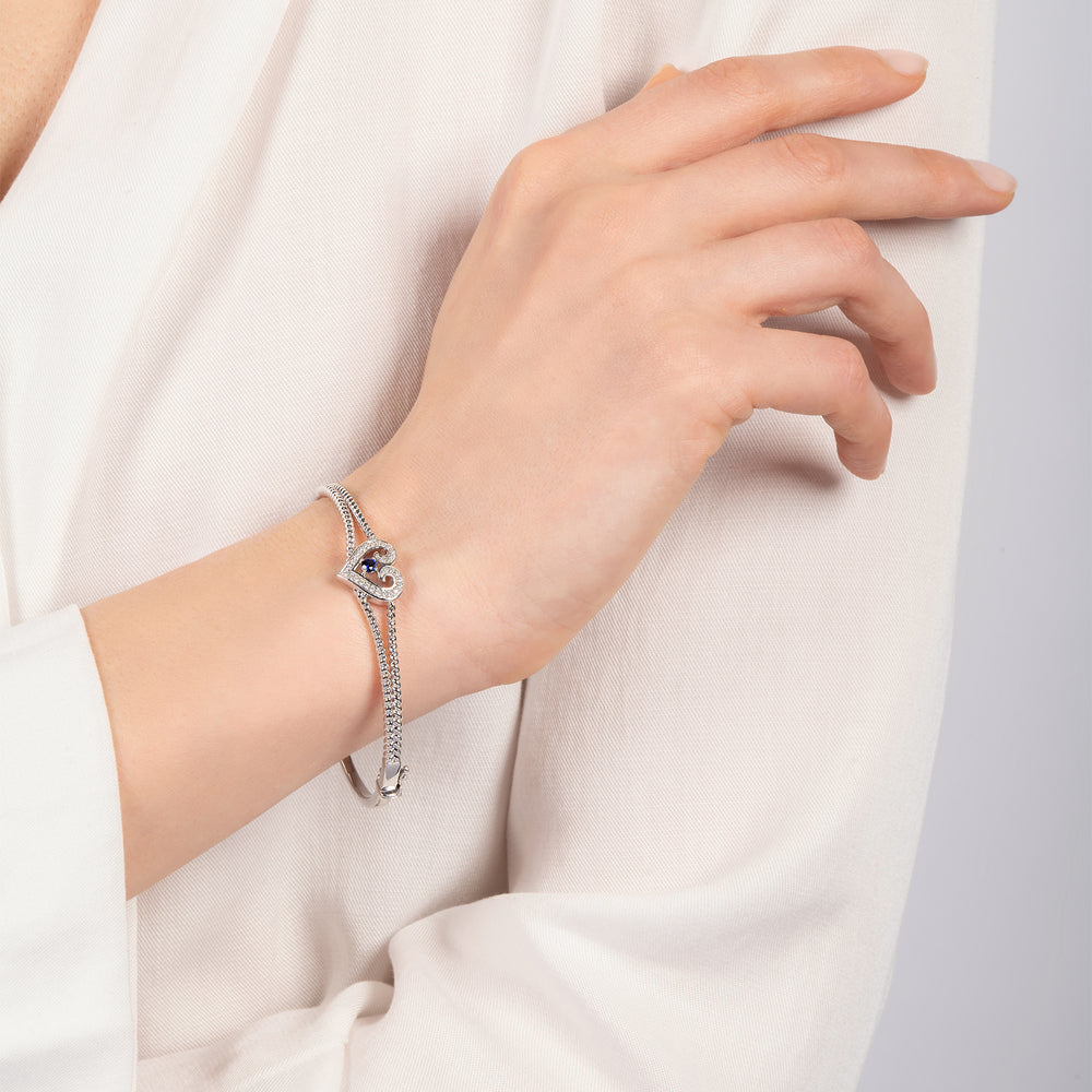 Hallmarkfinejewelry Follow Your Heart Bangle in Sterling Silver with Created Blue Sapphire & Diamonds