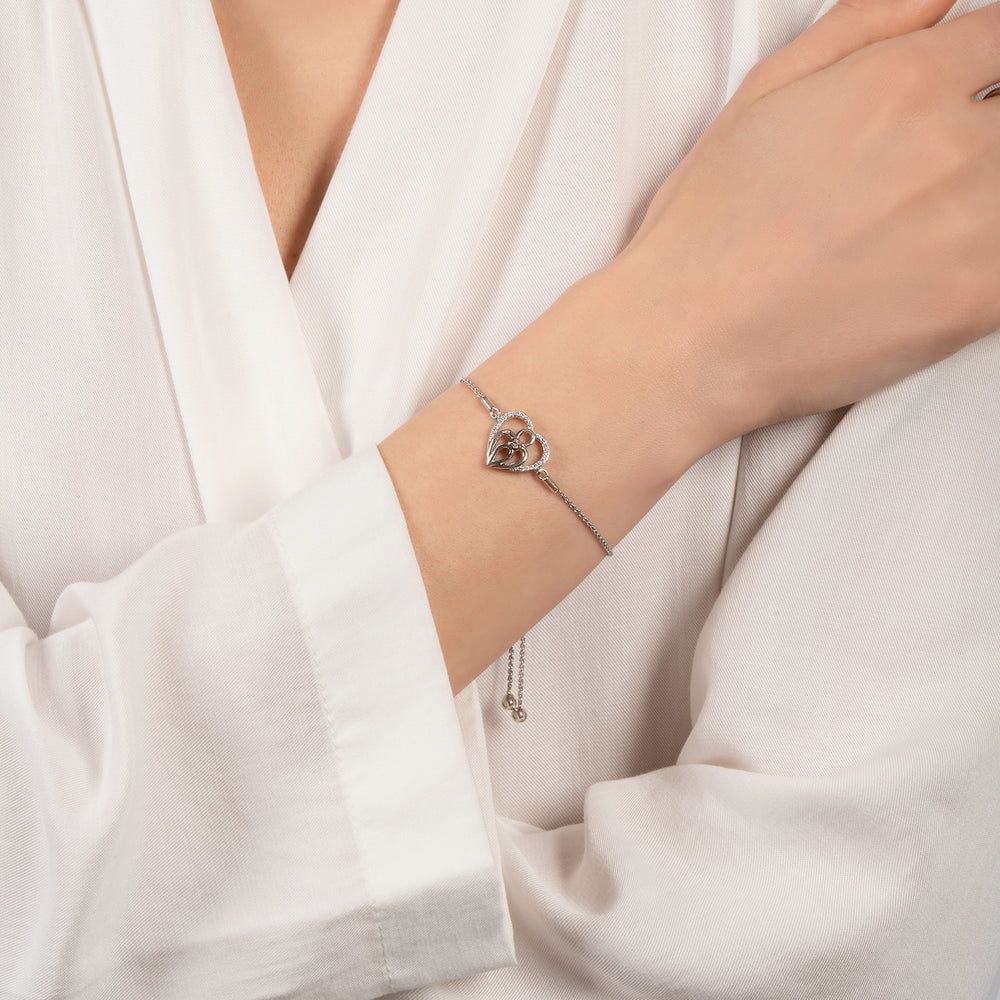 Hallmarkfinejewelry Family Heart Bolo Bracelet in Sterling Silver with 1/6 Cttw of Diamonds