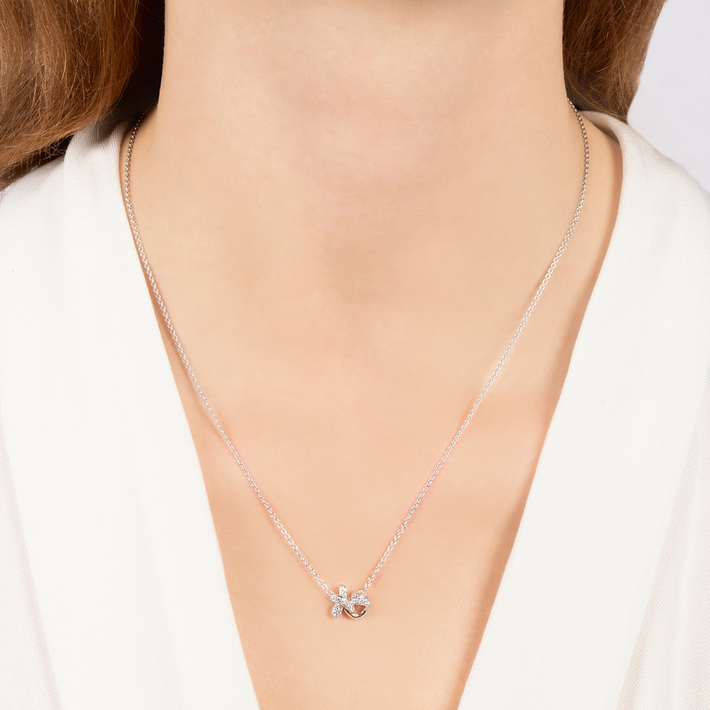Hallmarkfinejewelry Sculpted Hug and Kiss Necklace in Sterling Silver with 1/8 Cttw of Sparkling Diamonds