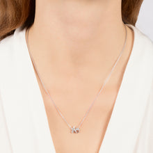 Load image into Gallery viewer, Hallmarkfinejewelry Sculpted Hug and Kiss Necklace in Sterling Silver with 1/8 Cttw of Sparkling Diamonds
