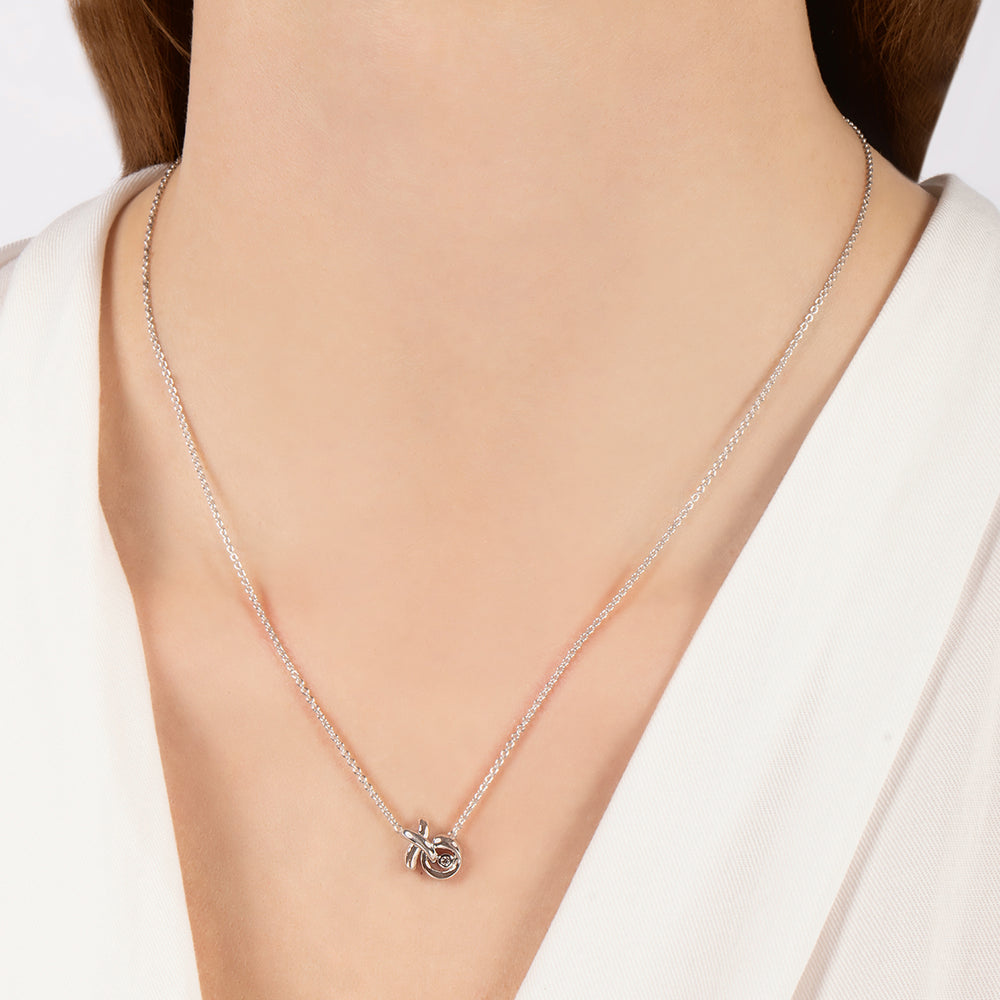 Hallmarkfinejewelry Sculpted Hug and Kiss Pendant in sterling silver with Diamond Accents