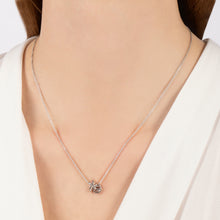 Load image into Gallery viewer, Hallmarkfinejewelry Sculpted Hug and Kiss Pendant in sterling silver with Diamond Accents
