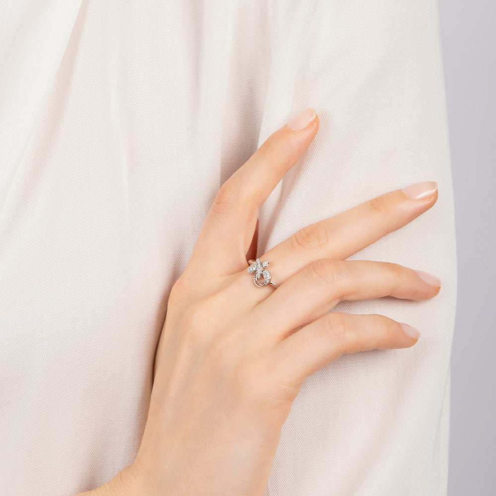 Hallmarkfinejewelry Sculpted Hug and Kiss Ring in Sterling Silver with 1/8 Cttw of Sparkling Diamonds